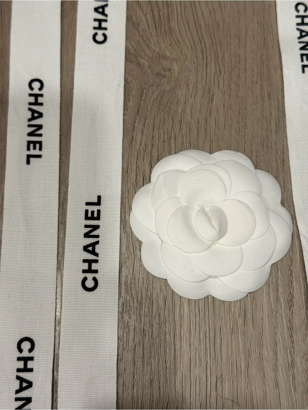 CHANEL ribbons, charms, camellias